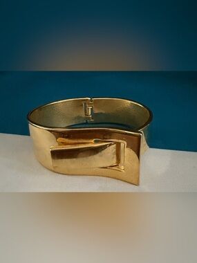 Gold Tone Bow Hinged Bracelet